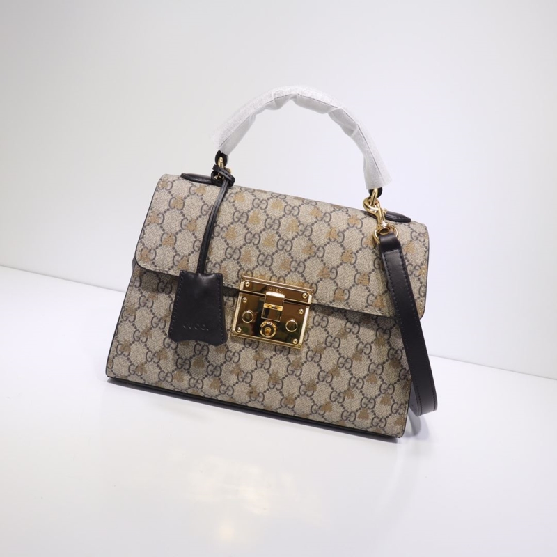 G*u*i top handle bags